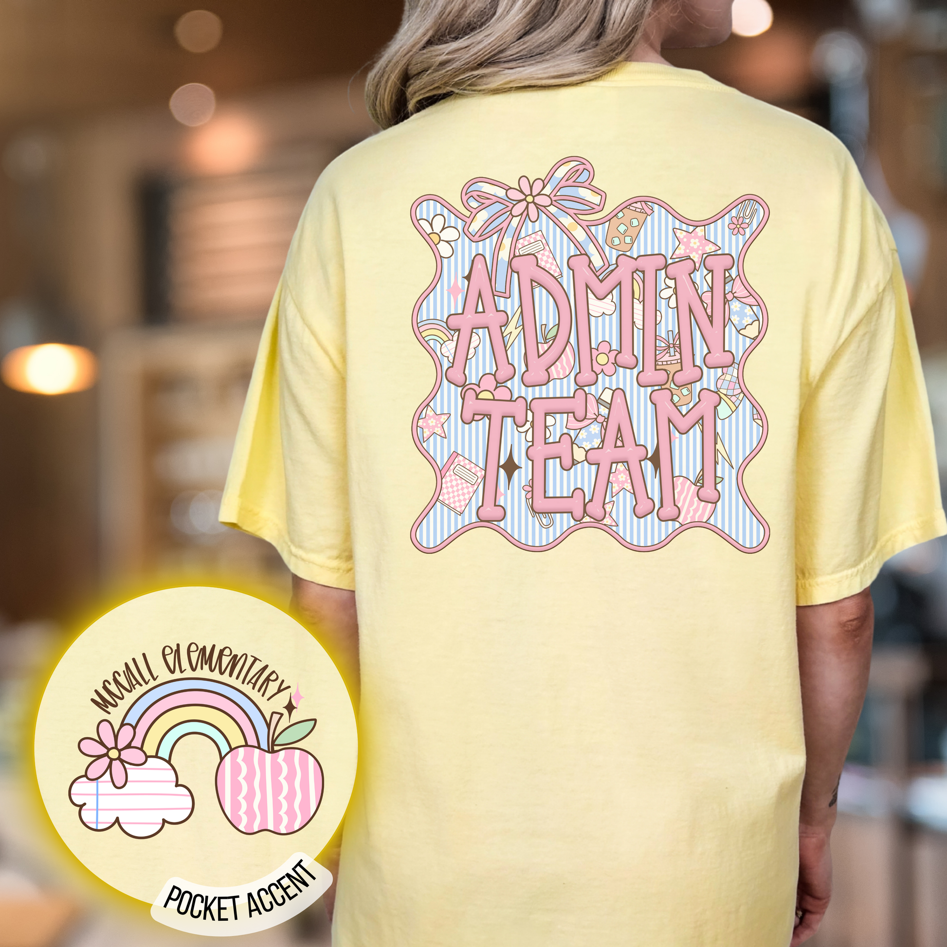 Person wearing a yellow t-shirt with 'ADMIN TEAM' design, blurred background