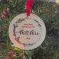 Video of acrylic ornament hanging on a tree that says Our first Christmas as Mr and Mrs 2023, surrounded by a holly wreath.
